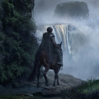 Всадник направляется в замок, расположенный среди гор и водопадов
